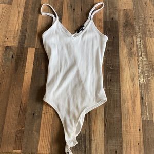 Spaghetti strap white tank body suit